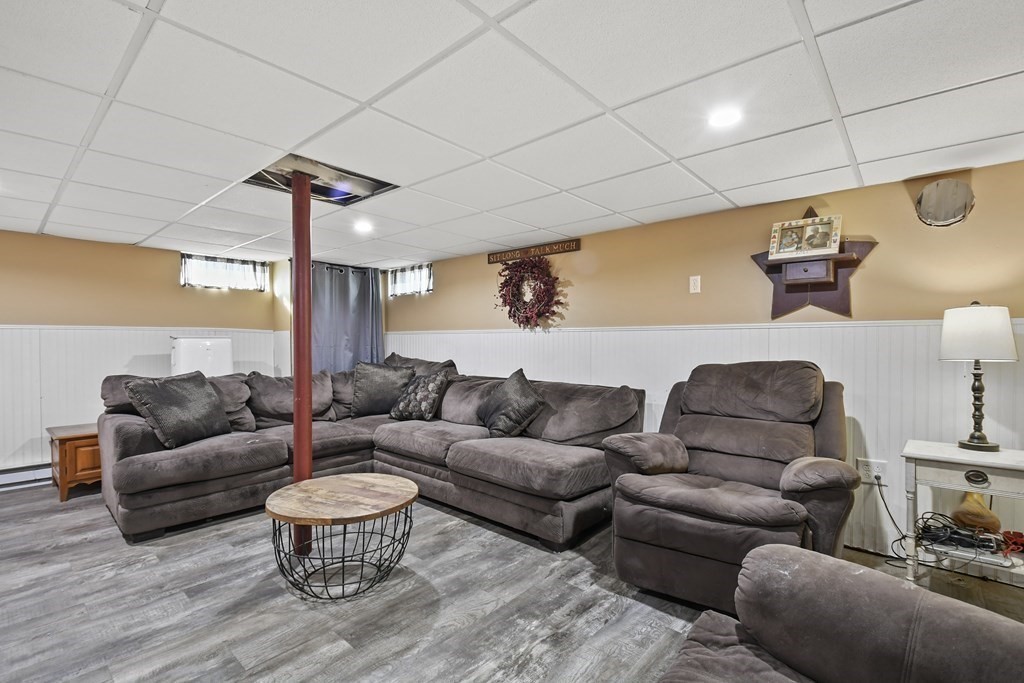 82 Stafford Road Holland, MA 01521 - Photo 13 of 18 a living room with furniture and a wooden floor