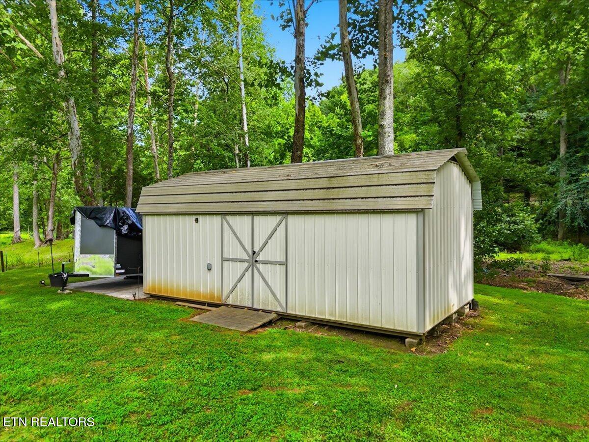 2042 Dutch Valley Road Clinton, TN 37716 - Photo 24 of 26 25-003_DJI_20260714164013_0565_D