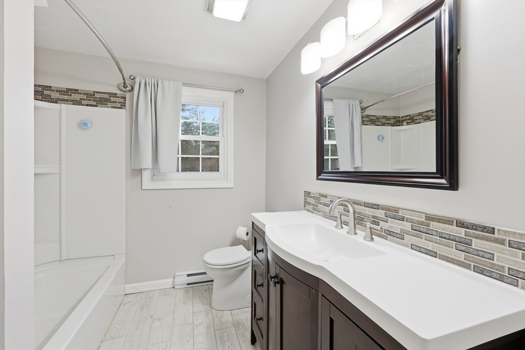 117 Draper Road East Brookfield, MA 01515 - Photo 16 of 27 a bathroom with a sink vanity and a mirror
