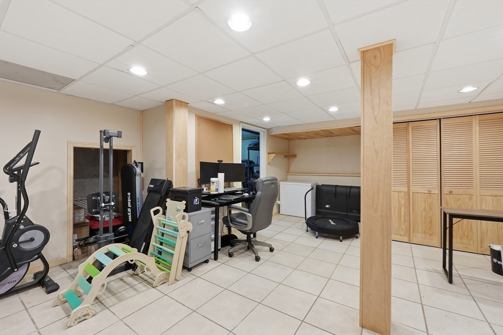 117 Draper Road East Brookfield, MA 01515 - Photo 17 of 27 a view of a room with gym equipment