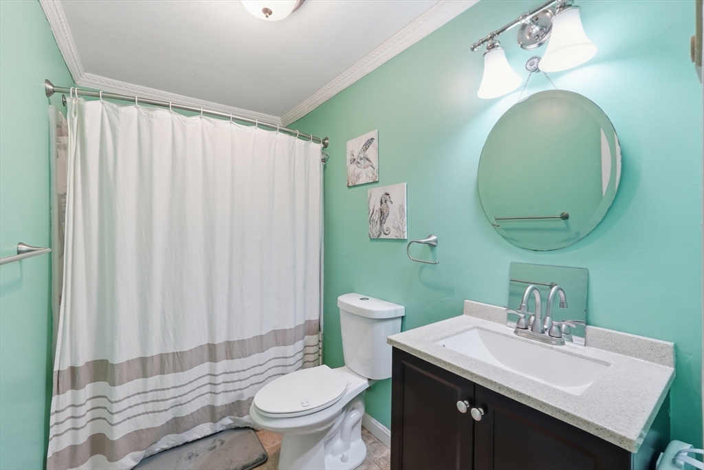 117 Draper Road East Brookfield, MA 01515 - Photo 19 of 27 a bathroom with a sink a toilet and mirror