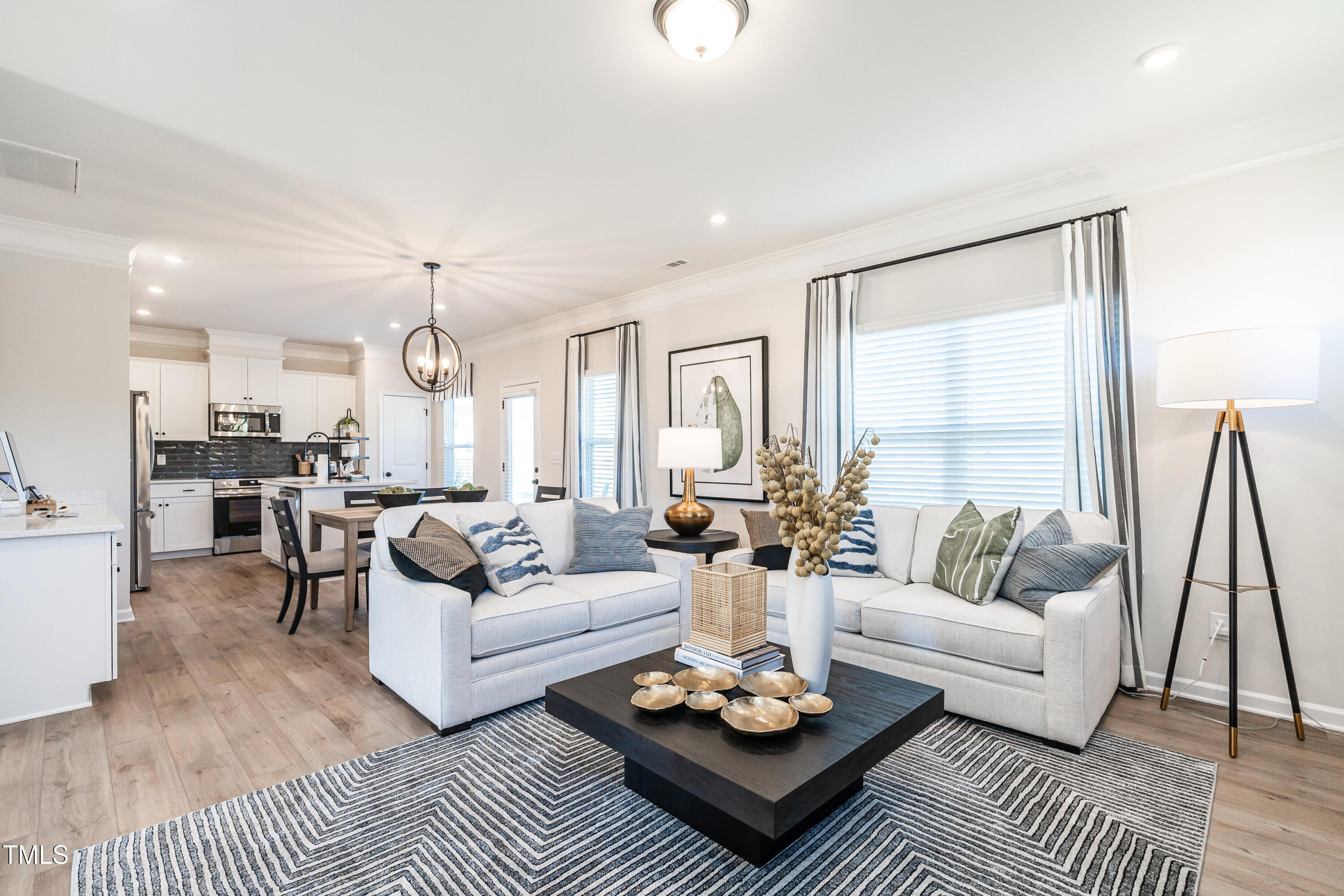 275 Deodora Lane Cameron, NC 28326 - Photo 10 of 38 a living room with furniture kitchen view and a table