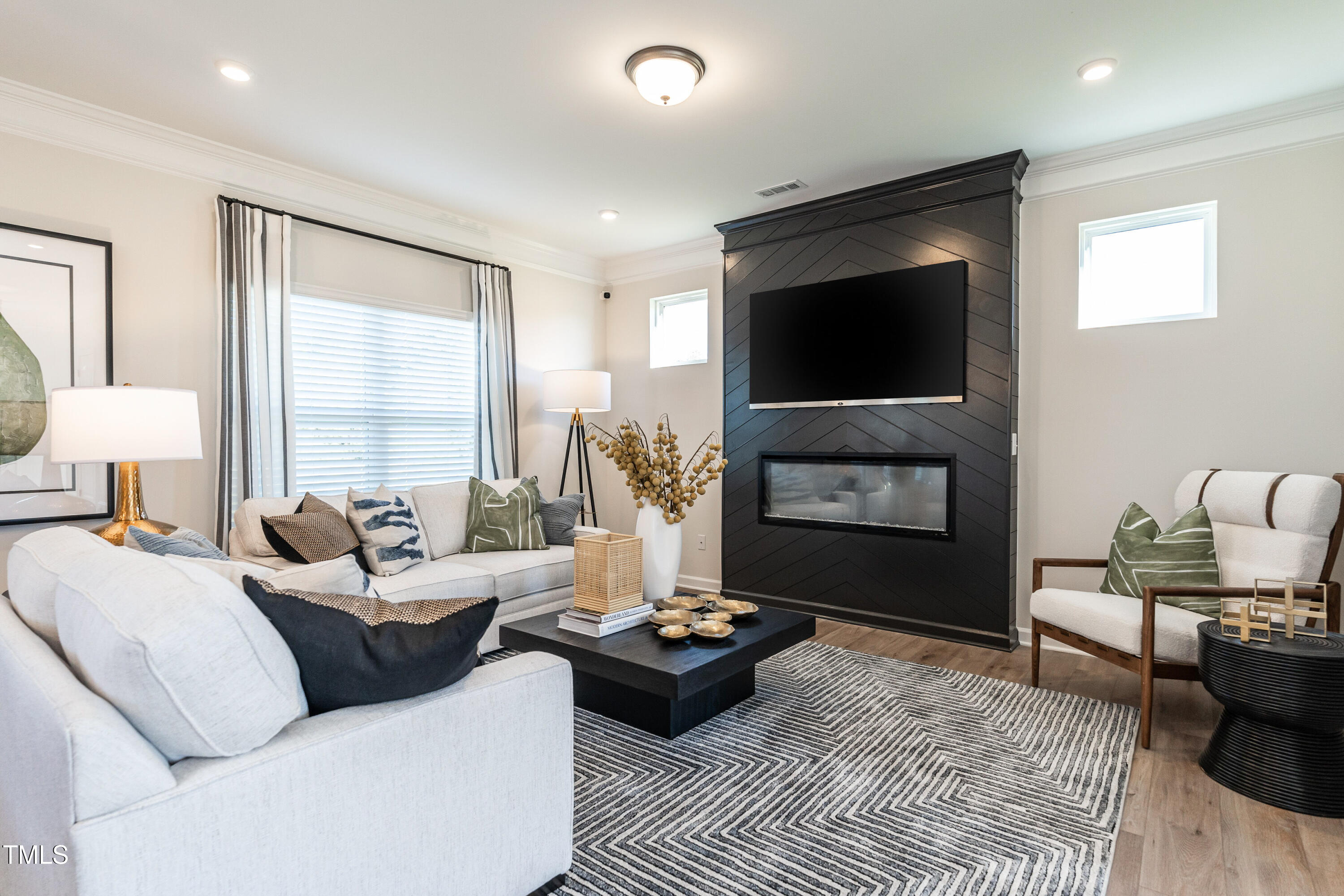 275 Deodora Lane Cameron, NC 28326 - Photo 8 of 38 a living room with furniture and a flat screen tv