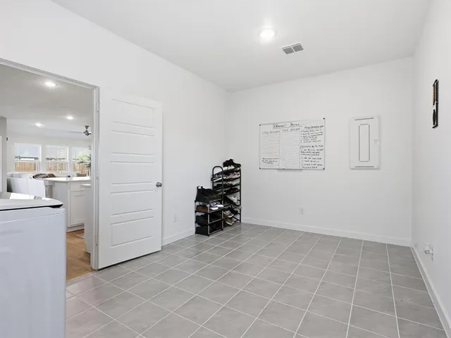 a view of utility room and utility room