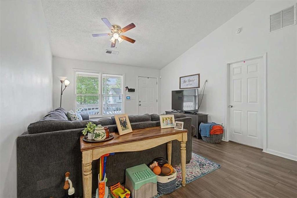 94 Villa Rosa Way Temple, GA 30179 - Photo 14 of 34 a living room with furniture and a window