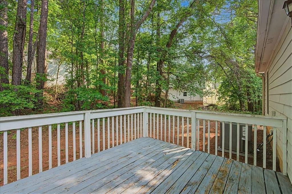 94 Villa Rosa Way Temple, GA 30179 - Photo 24 of 34 a balcony with wooden floor and fence