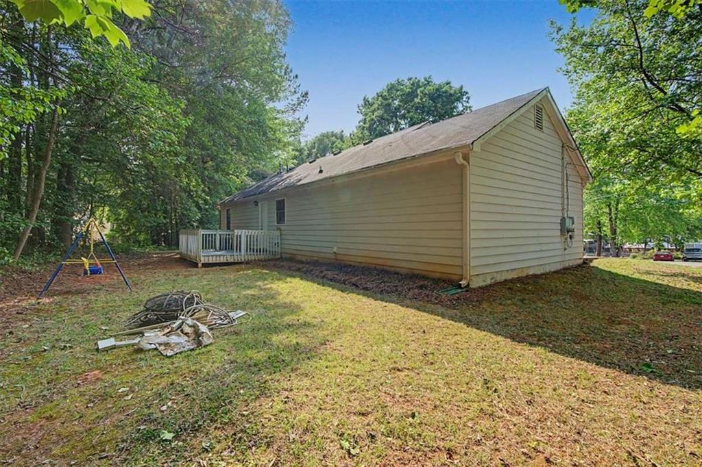 94 Villa Rosa Way Temple, GA 30179 - Photo 27 of 34 a view of backyard with green space