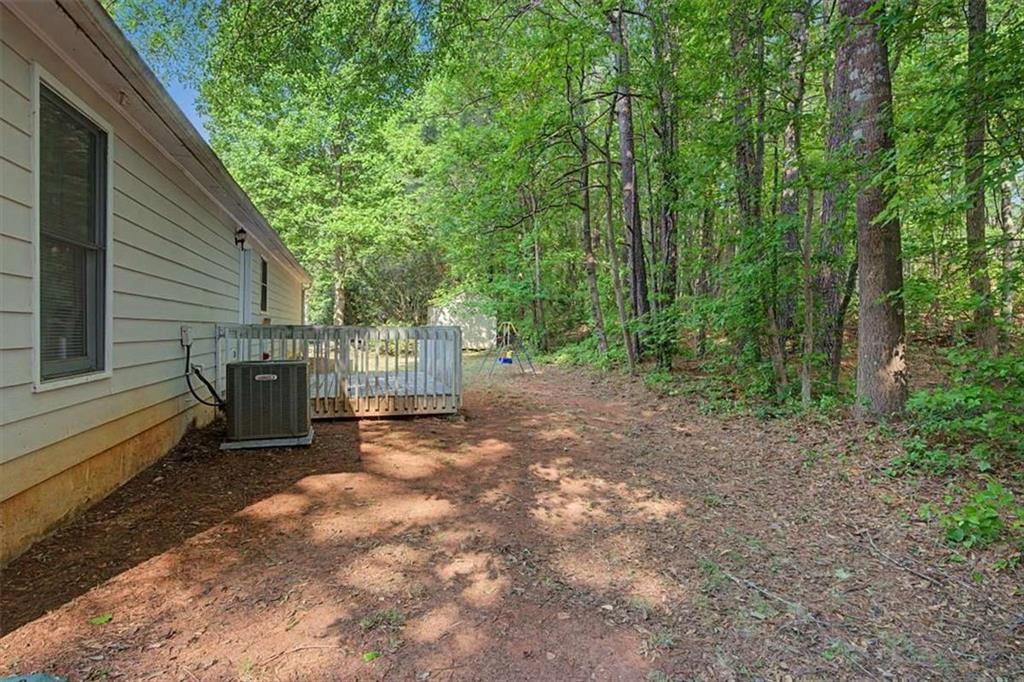 94 Villa Rosa Way Temple, GA 30179 - Photo 29 of 34 a view of a back yard of the house