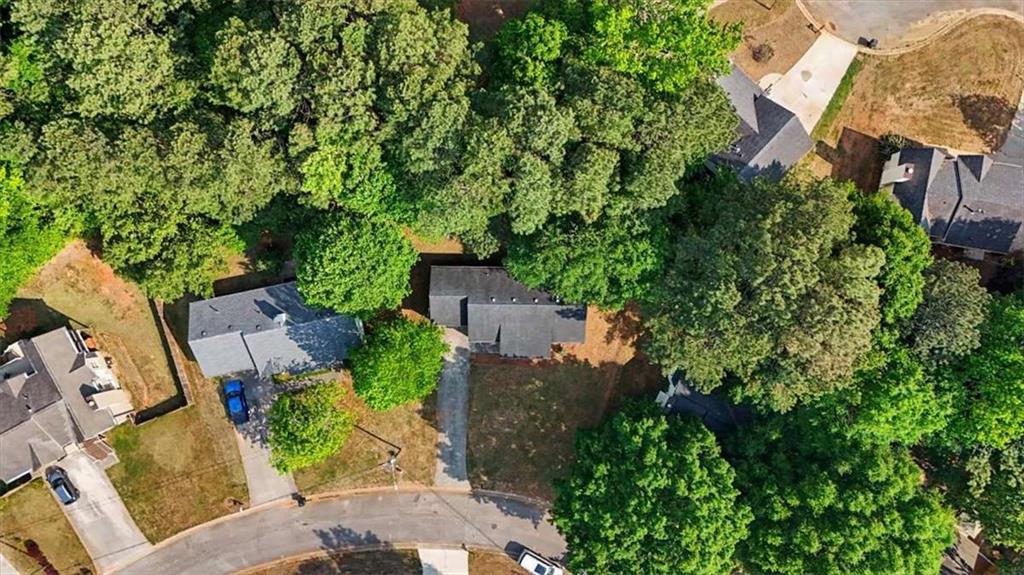 94 Villa Rosa Way Temple, GA 30179 - Photo 31 of 34 an aerial view of a house with a yard and garden