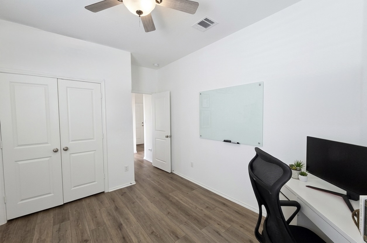 208 Wolf Springs Road Georgetown, TX 78628 - Photo 20 of 32 Functional office space provides ample room for productivity with durable flooring and excellent lighting.