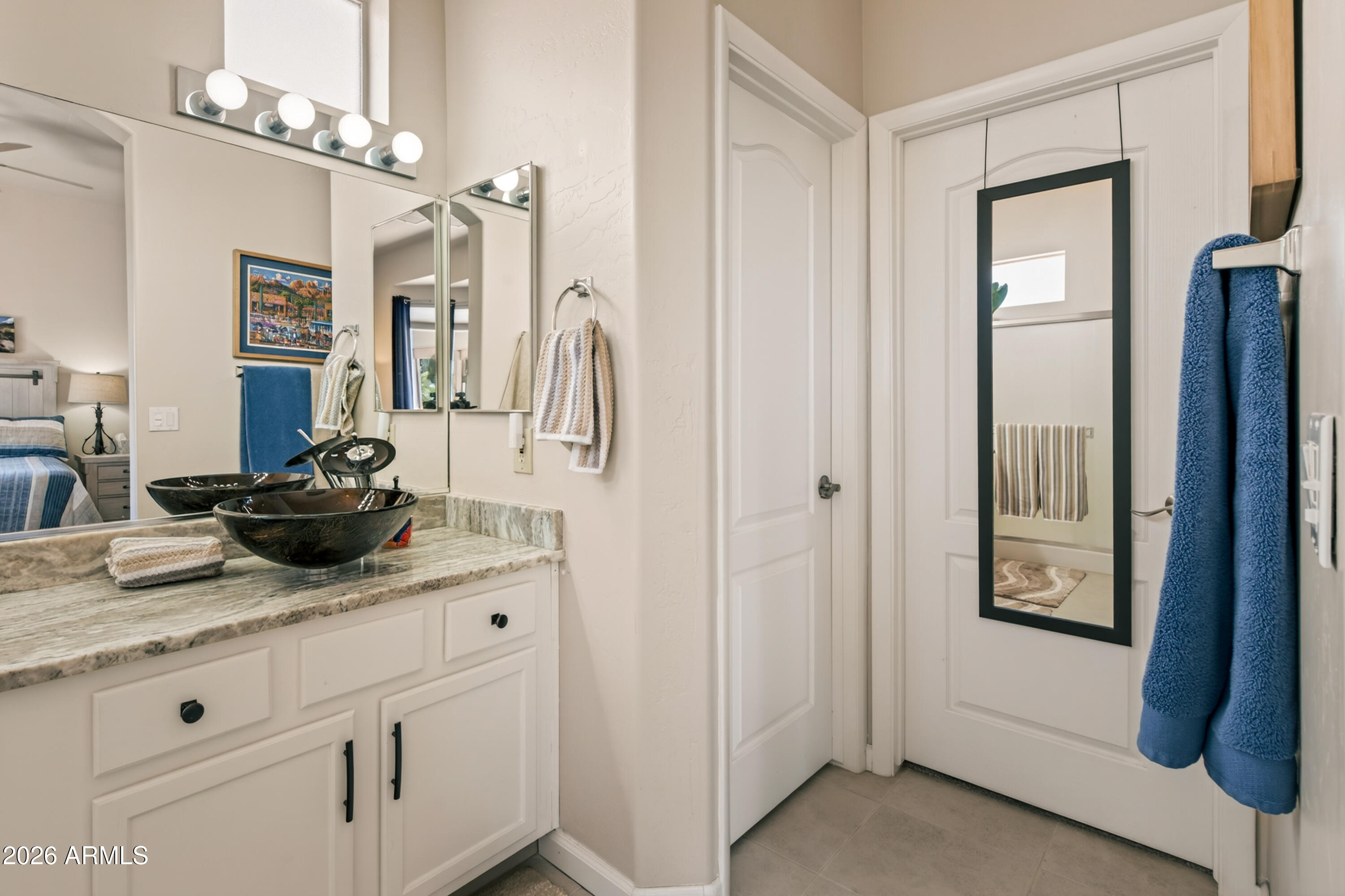 718 South Wandering River Road Cornville, AZ 86325 - Photo 24 of 41 a bathroom with a sink a vanity and a mirror