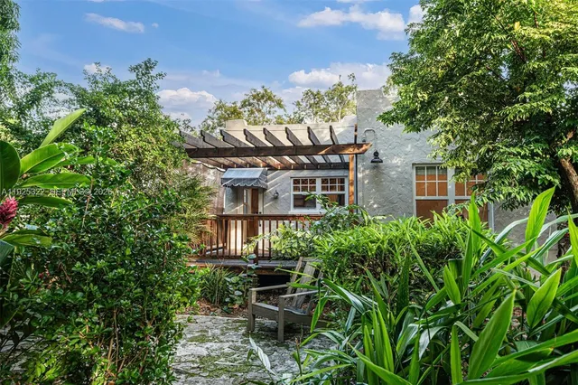 a view of a house with a sitting area