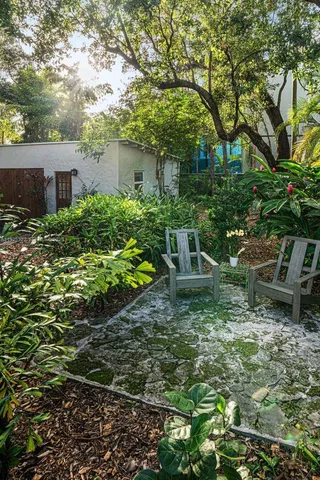 a backyard of a house with lots of green space
