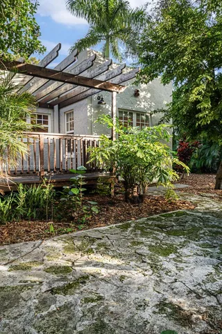 a backyard of a house with lots of green space