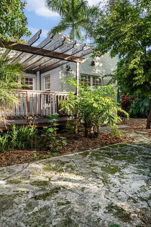 a backyard of a house with lots of green space