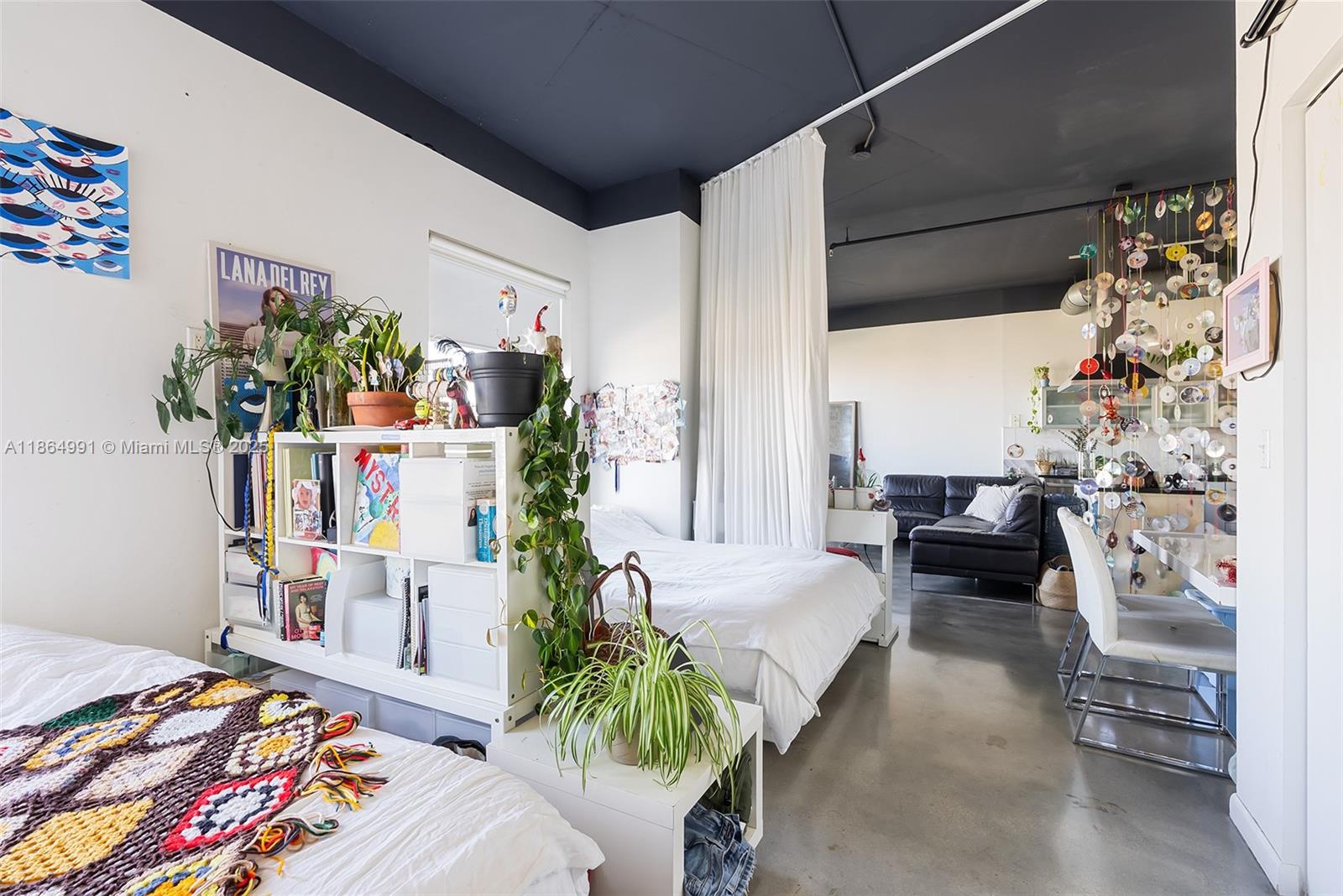 Riverside Miami, FL 33130 - Photo 7 of 20 a reading room with furniture and a potted plant