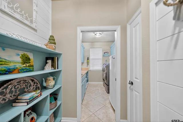 a view of hallway with seating area