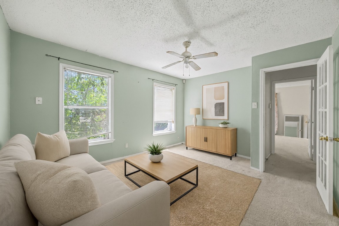 908 Vargas Road Austin, TX 78741 - Photo 11 of 28 a living room with furniture and window