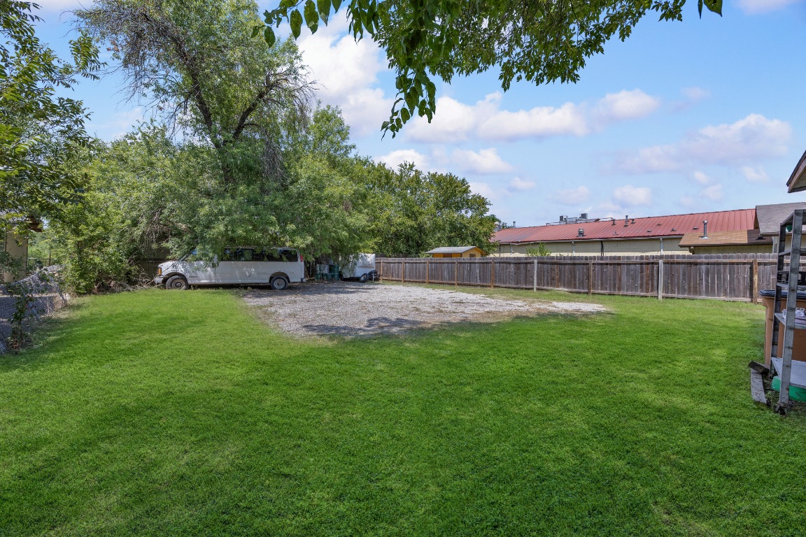 908 Vargas Road Austin, TX 78741 - Photo 24 of 28 a view of yard with grass and trees