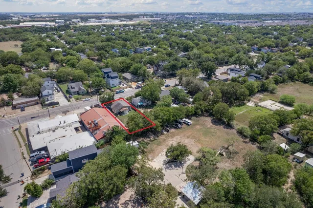 an aerial view of a city with lots of residential buildings