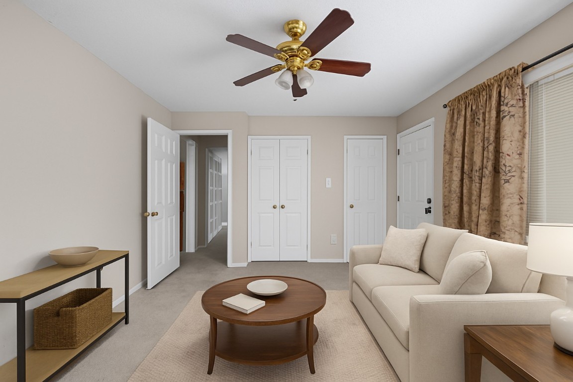 908 Vargas Road Austin, TX 78741 - Photo 7 of 28 a living room with furniture and a wooden floor