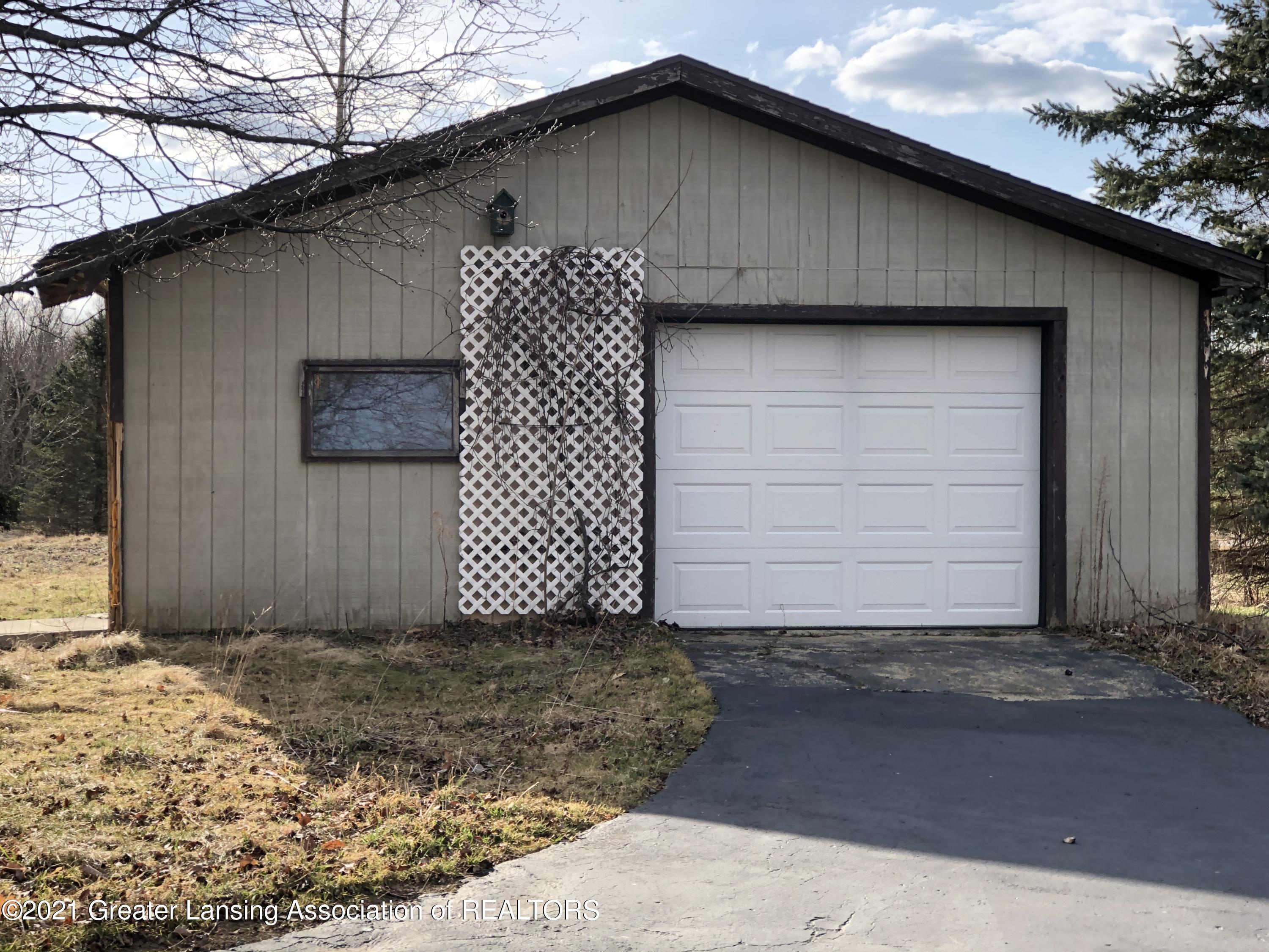 4676 Williamston Road Stockbridge, MI 49285 - Photo 10 of 19 Garage Door front view
