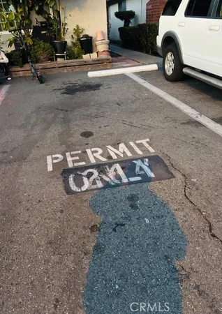 a view of a car parked in back of a house