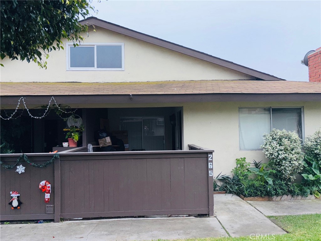 9155 Pacific Avenue, Unit 265 Anaheim, CA 92804 - Photo 2 of 18 a front view of a house