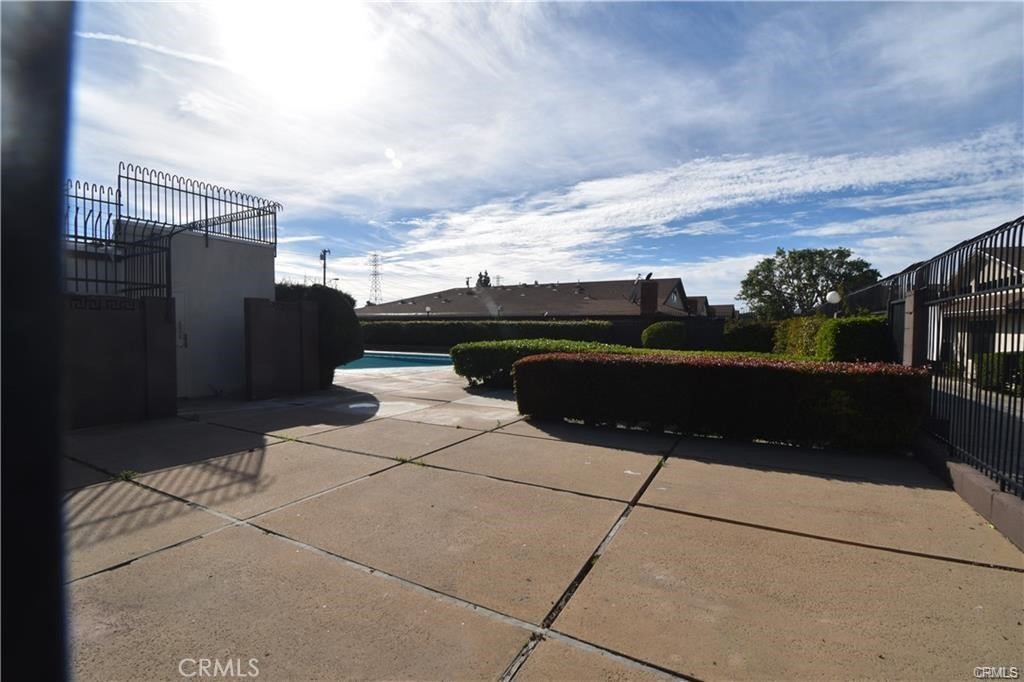 9155 Pacific Avenue, Unit 265 Anaheim, CA 92804 - Photo 5 of 18 a terrace view with sitting space and garden