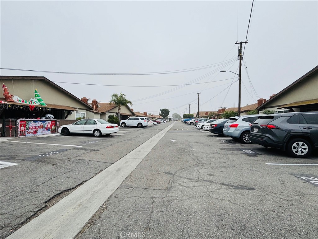 9155 Pacific Avenue, Unit 265 Anaheim, CA 92804 - Photo 7 of 18 a car parked on the side of a street