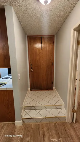 a bedroom with a bed and a mirror