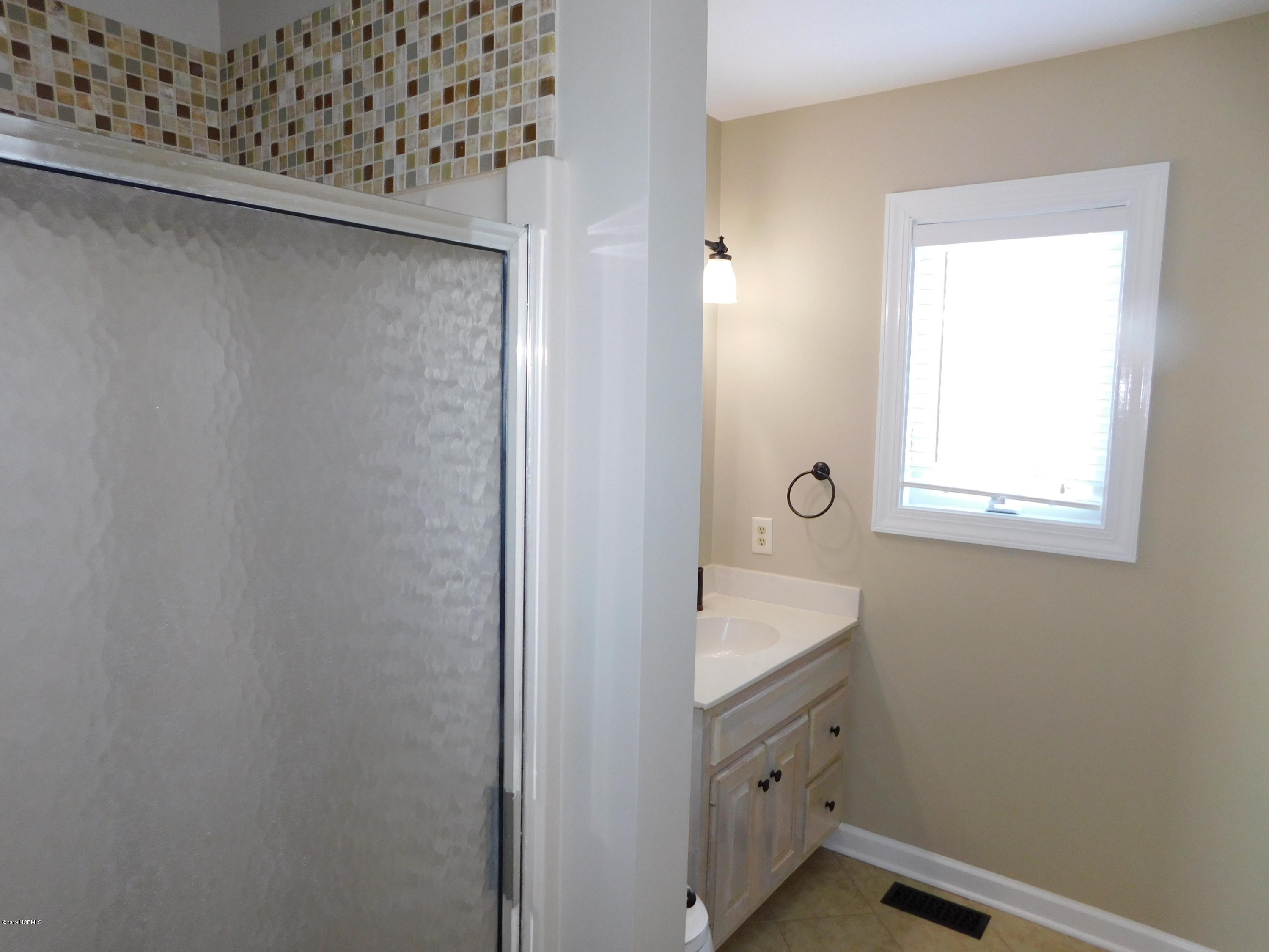 711 Salter Path Road Indian Beach, NC 28512 - Photo 52 of 84 OCEANFRONT BEDROOM SUITE BATHROOM VIEW