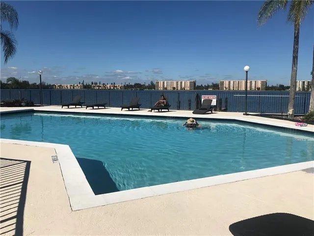 a view of a terrace with a lake view