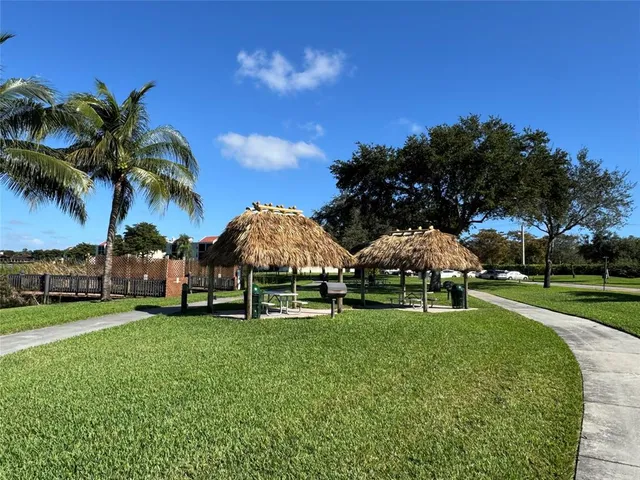 a view of a backyard of the house