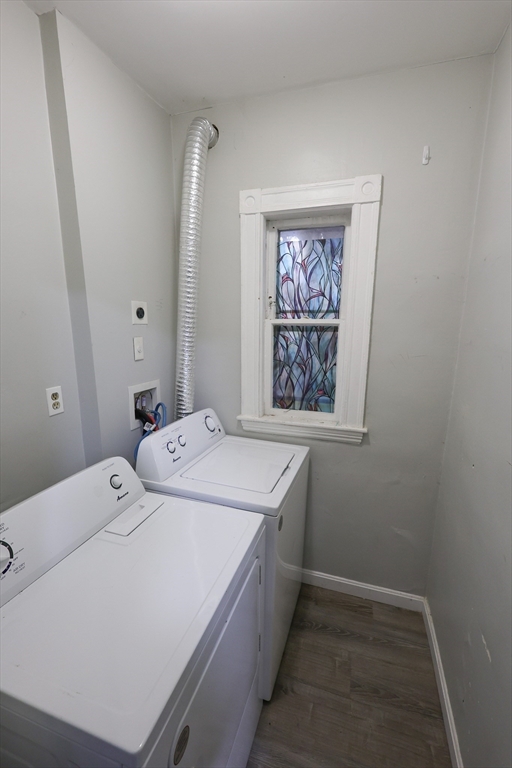82 Fuller Street, Unit 1 Boston, MA 02124 - Photo 5 of 13 a utility room with dryer and washer