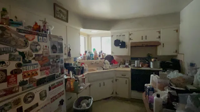 a room with a storage and utility room