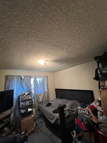 a room with furniture and a flat screen tv
