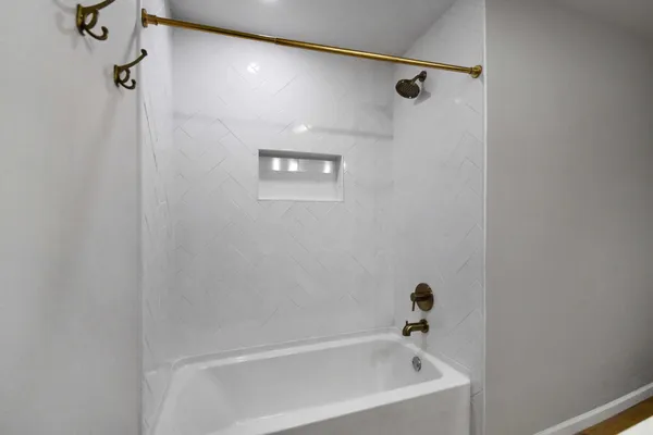 a bathroom with a bathtub
