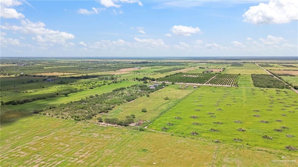 27870 North Western Road Mission, TX 78574 - Photo 6 of 8 Expansive agricultural landscape featuring multiple cultivated fields and scattered structures