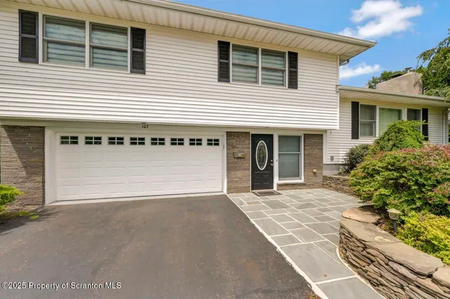 a view of a house with a outdoor space