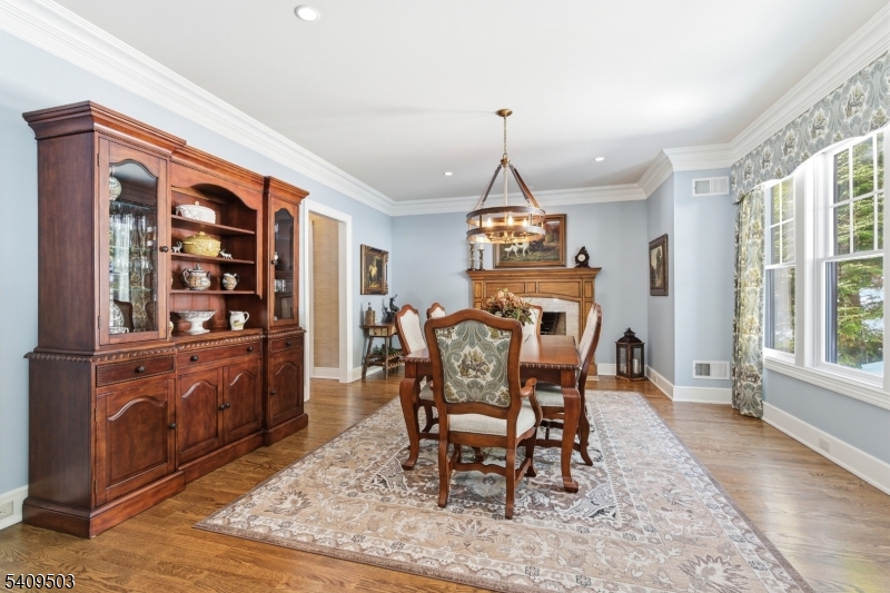 89 Woods Road Branchville, NJ 07826 - Photo 15 of 49 a view of a dining room with furniture window and wooden floor