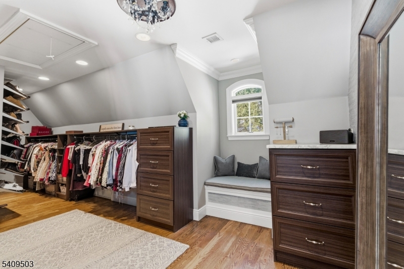 89 Woods Road Branchville, NJ 07826 - Photo 21 of 49 a view of walk in closet with clothes and shoes