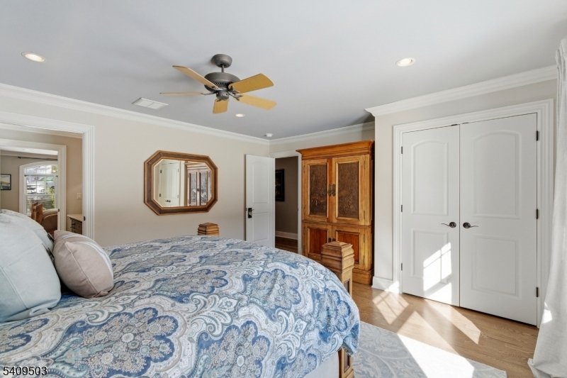89 Woods Road Branchville, NJ 07826 - Photo 27 of 49 a bedroom with a large bed and a dresser