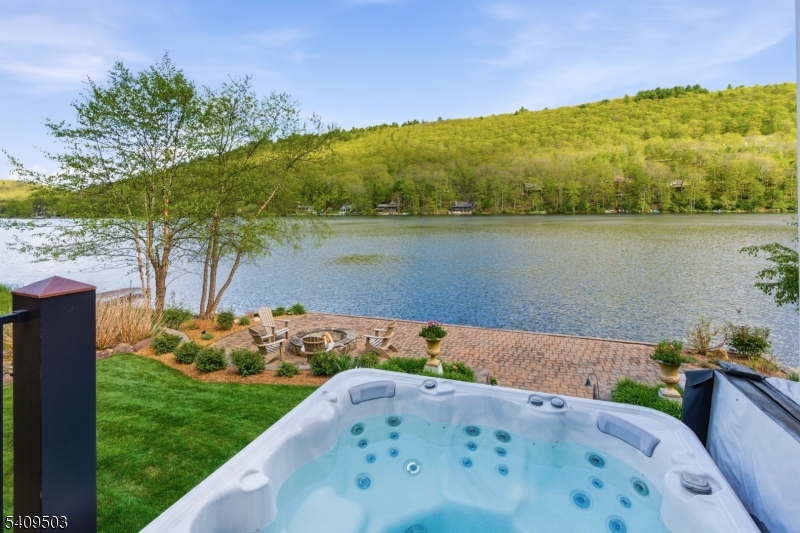 89 Woods Road Branchville, NJ 07826 - Photo 30 of 49 a view of a lake with a big yard