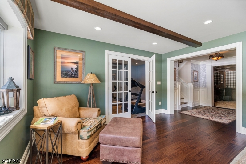 89 Woods Road Branchville, NJ 07826 - Photo 43 of 49 a living room with furniture and a wooden floor