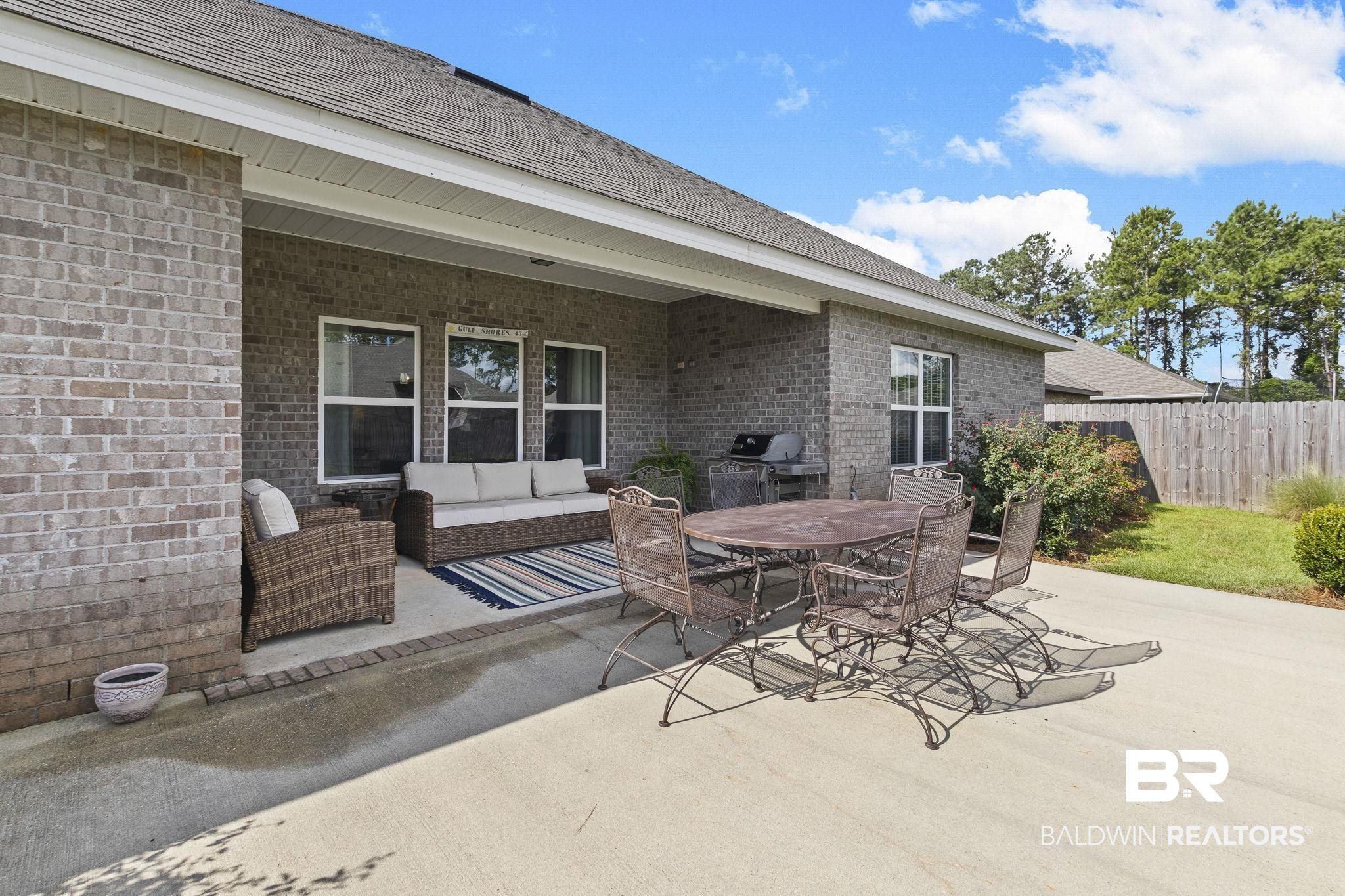 31663 Kestrel Loop Daphne, AL 36527 - Photo 58 of 86 View of patio featuring area for grilling and an outdoor hangout area