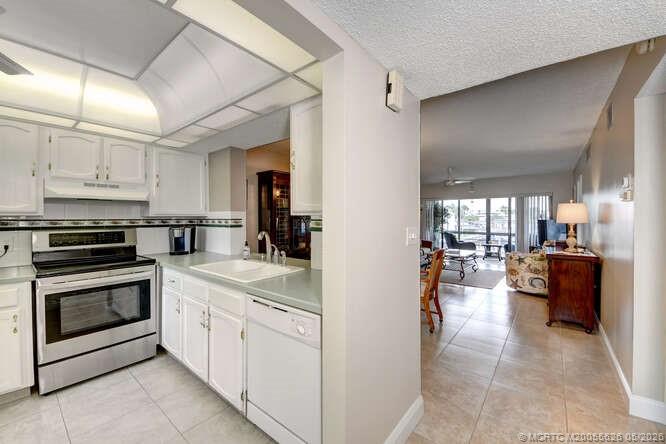 1950 Southwest Palm City Road, Unit 3209 Stuart, FL 34994 - Photo 16 of 64 Kitchen/Hallway.