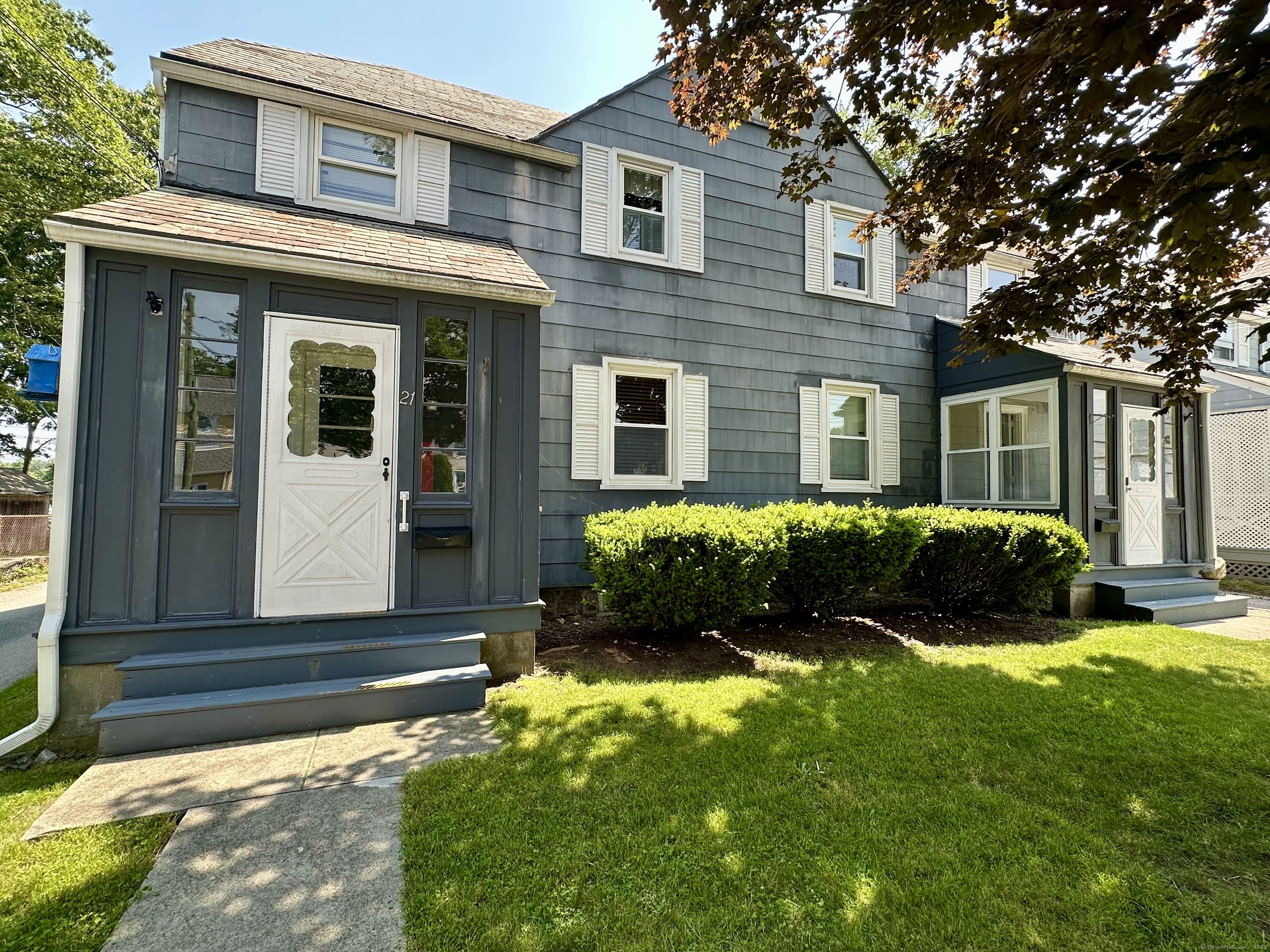 19 Colver Street New London, CT 06320 - Photo 1 of 1 a front view of a house with a yard