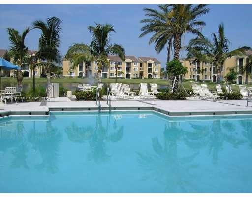 2080 West Preserve Way, Unit 207 Miramar, FL 33025 - Photo 13 of 20 a view of swimming pool and lake view