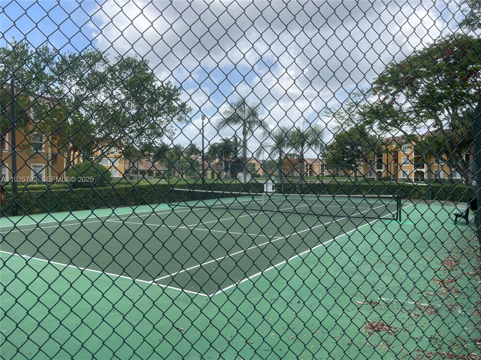 2080 West Preserve Way, Unit 207 Miramar, FL 33025 - Photo 16 of 20 a view of a yard and a fence